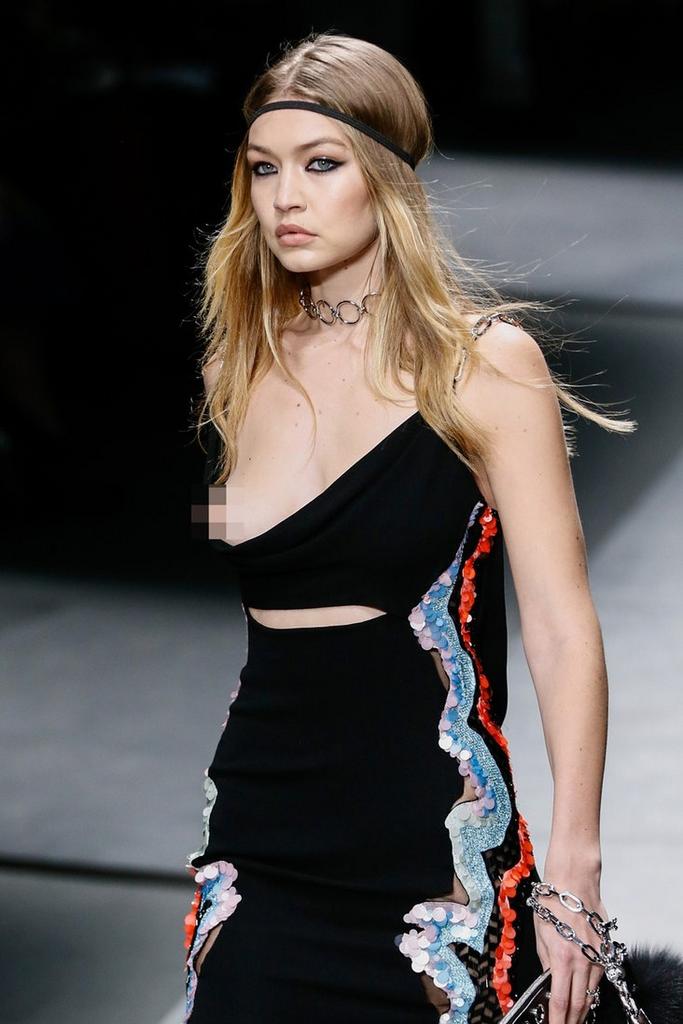 Hadid went to the audience to present a rather candid black dress on the fl...